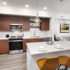 kitchen with large island and bar stools