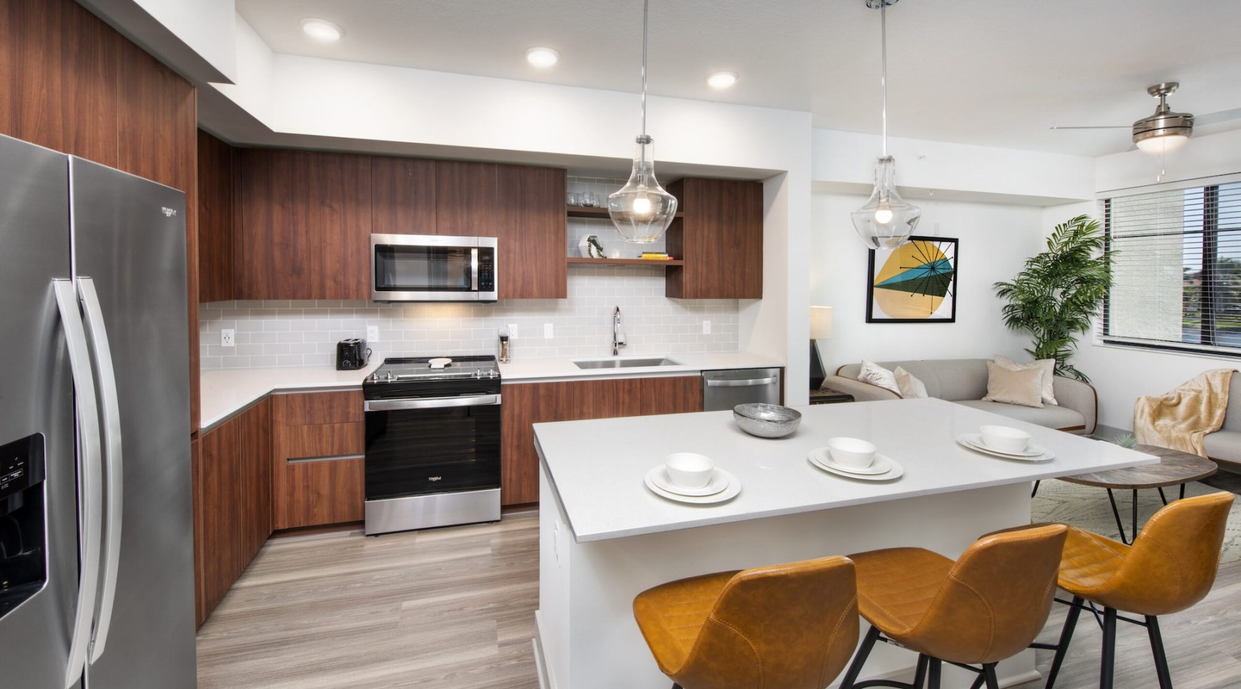 Luxury kitchen with an island at Solena Miramar apartments in Miramar, FL