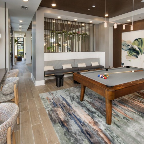 Enjoy our resident-only features a room with large windows and a pool table